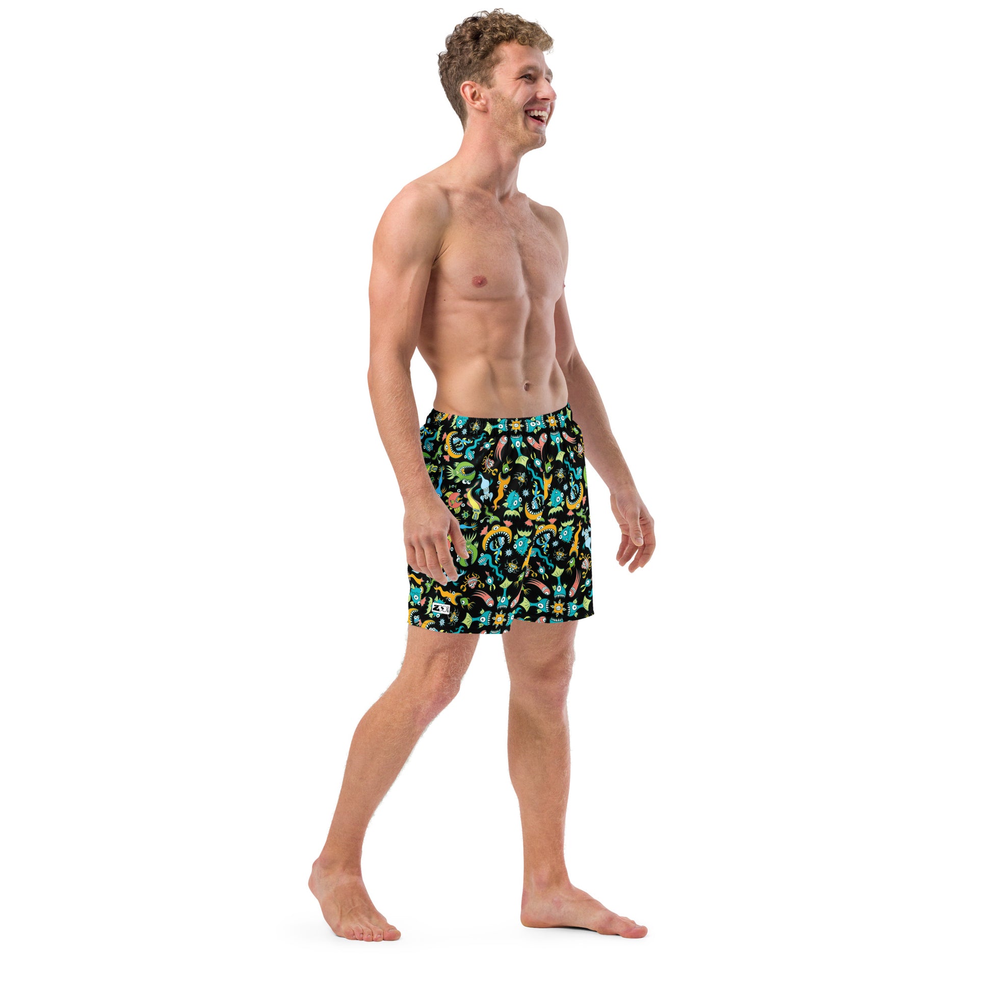 Happy man wearing Swim Trunks All-over printed with Sea creatures pattern design