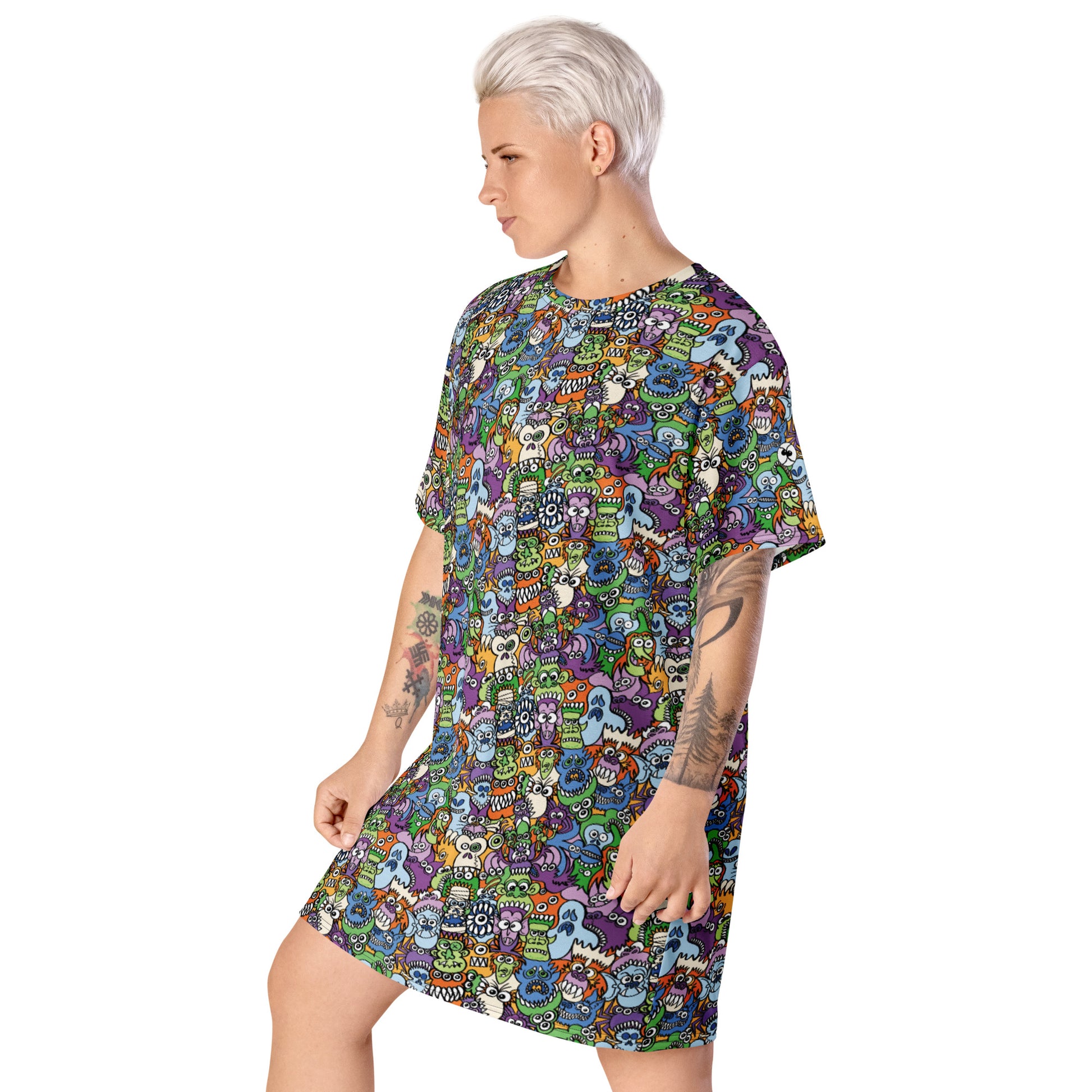 All the spooky Halloween monsters in a pattern design T-shirt dress. Side view