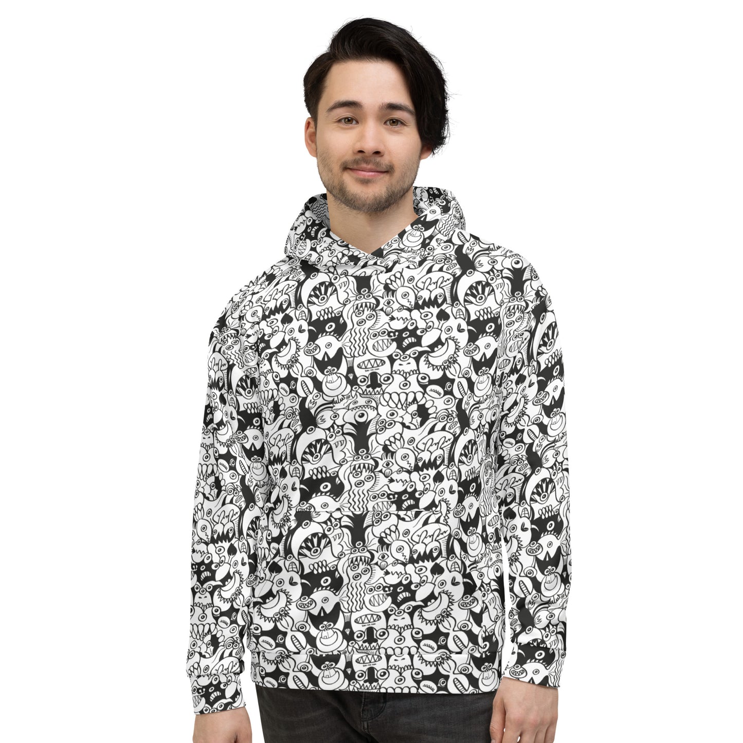 Young man wearing Unisex Hoodie All over printed with Black and white cool doodles art