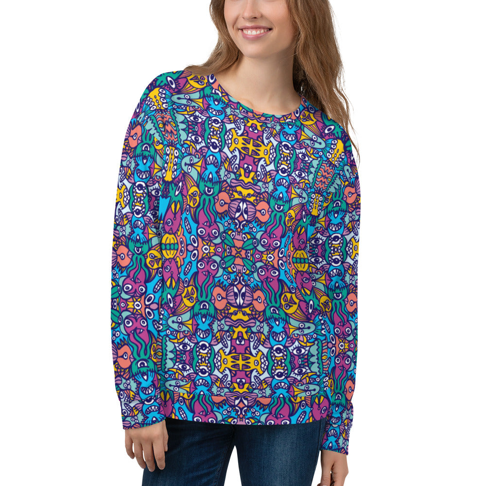 Smiling woman wearing Unisex Sweatshirt All over printed with Whimsical design featuring multicolor critters from another world