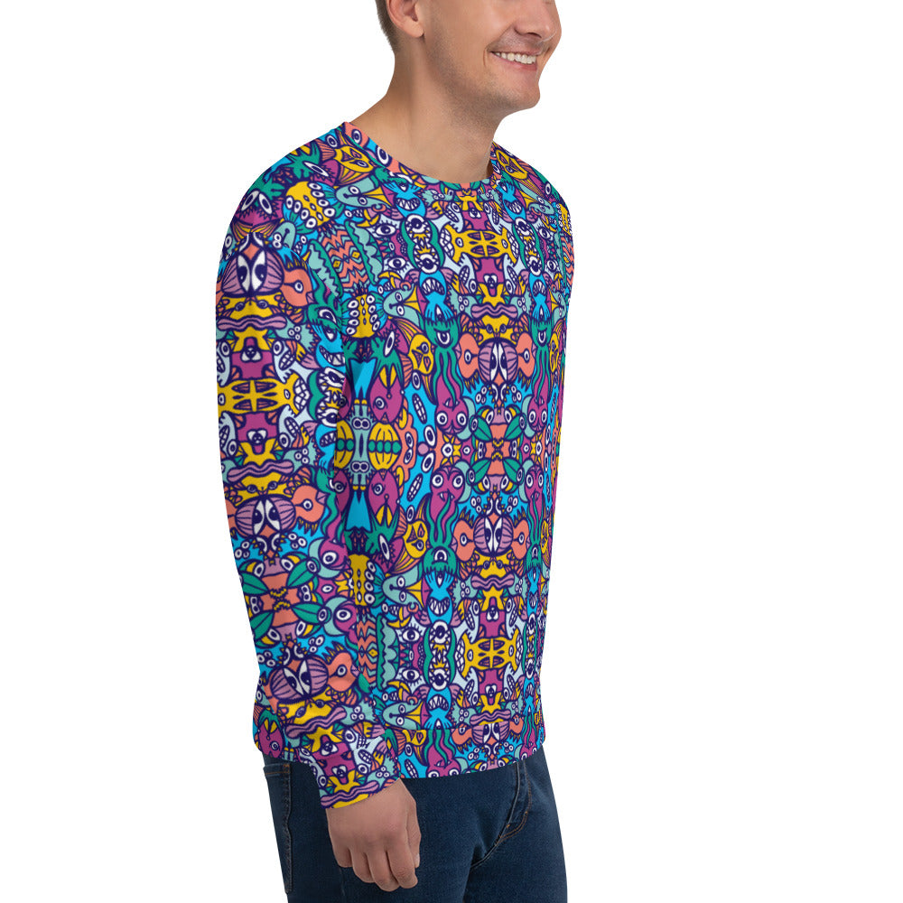 Smiling man wearing Unisex Sweatshirt All over printed with Whimsical design featuring multicolor critters from another world