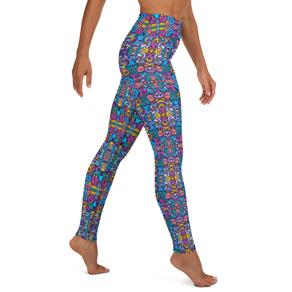Whimsical design featuring multicolor critters from another world Yoga Leggings. Side view
