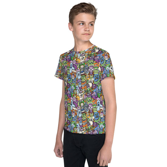 All the spooky Halloween monsters in a pattern design Youth crew neck t-shirt. Boy wearing all-over print T-Shirt
