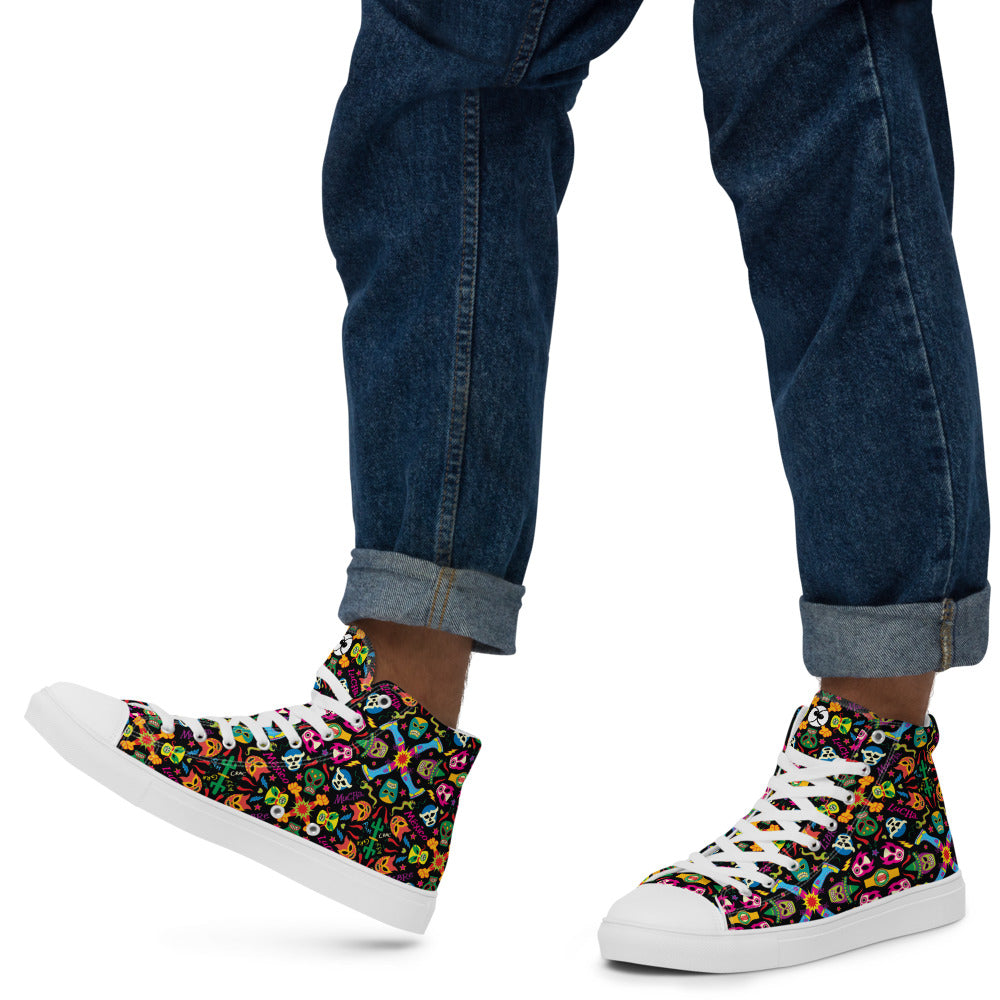 Man wearing high top canvas shoes printed with Mexican wrestling colorful party