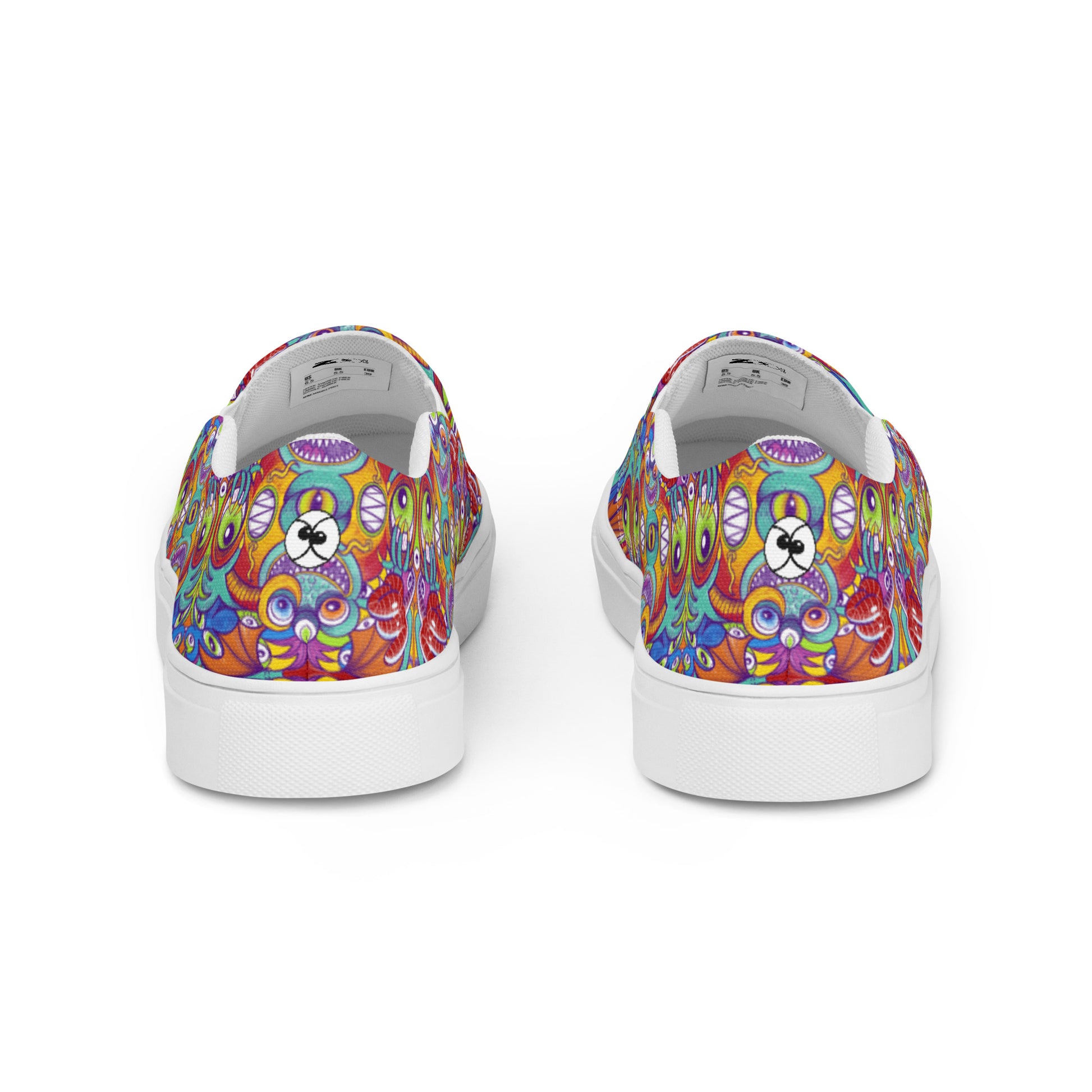 Psychedelic monsters having fun pattern design Men’s slip-on canvas shoes. Back view