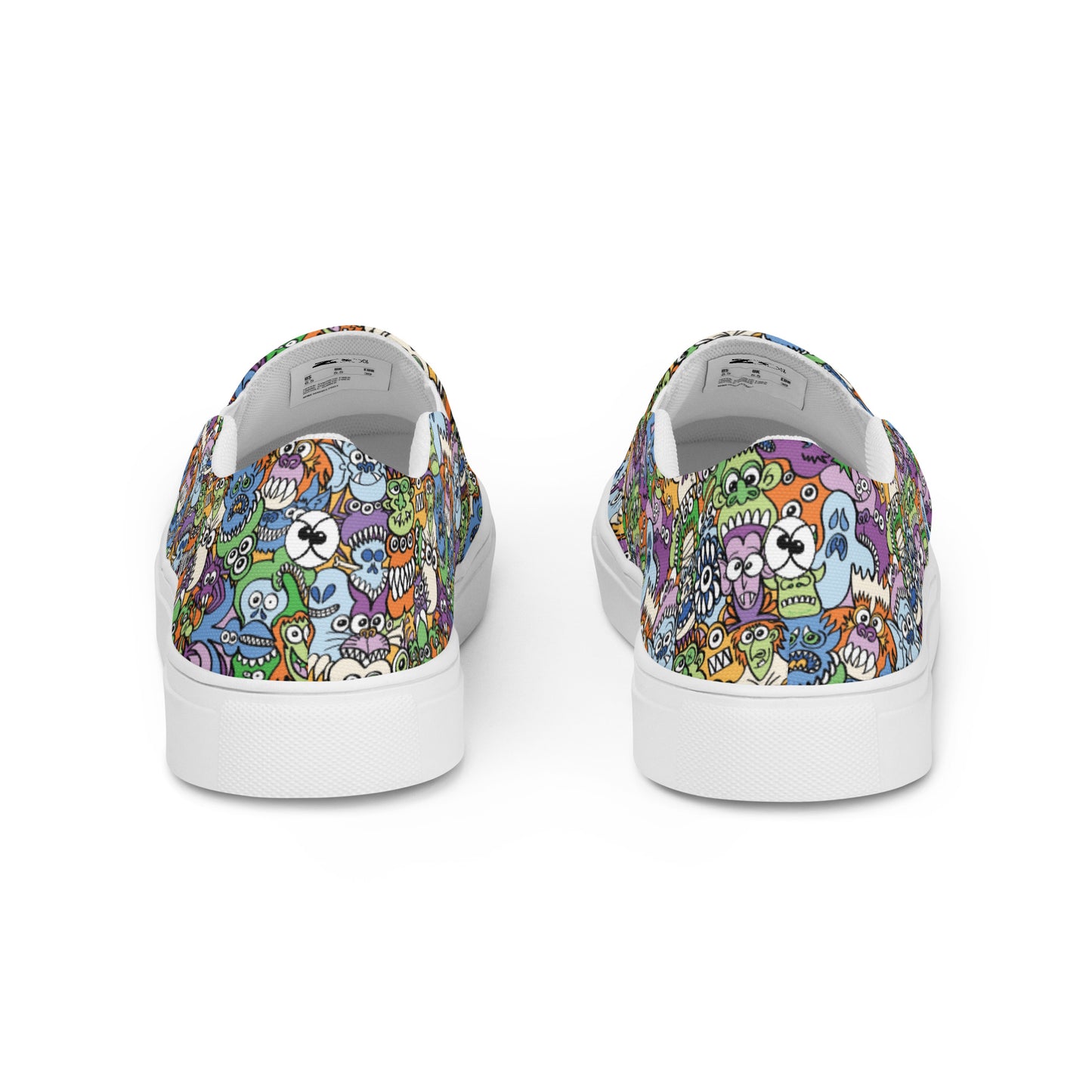 All the spooky Halloween monsters in a pattern design Men’s slip-on canvas shoes. Back view