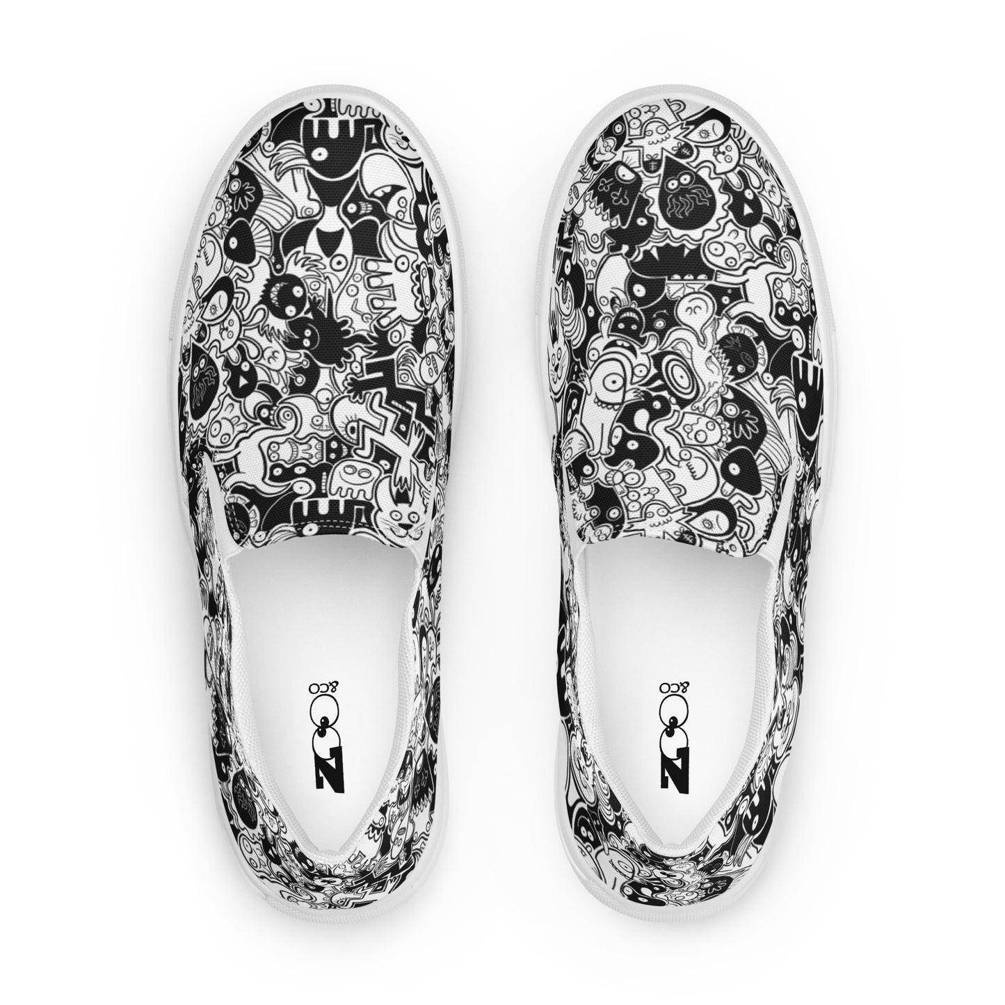 Joyful crowd of black and white doodle creatures Men’s slip-on canvas shoes. Top view