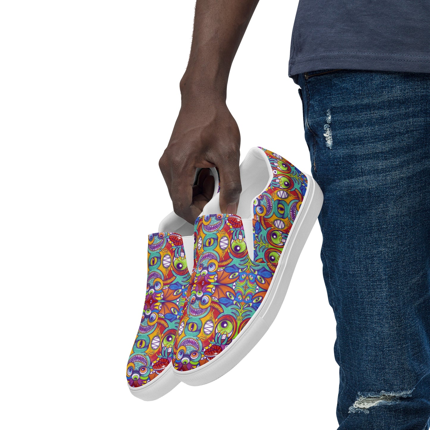 Psychedelic monsters having fun pattern design Men’s slip-on canvas shoes. Lifestyle