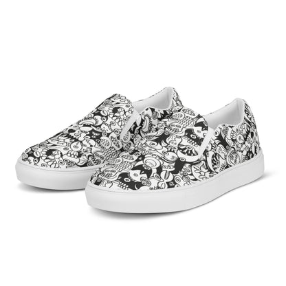 Black and white cool doodles art Men’s slip-on canvas shoes. Overview