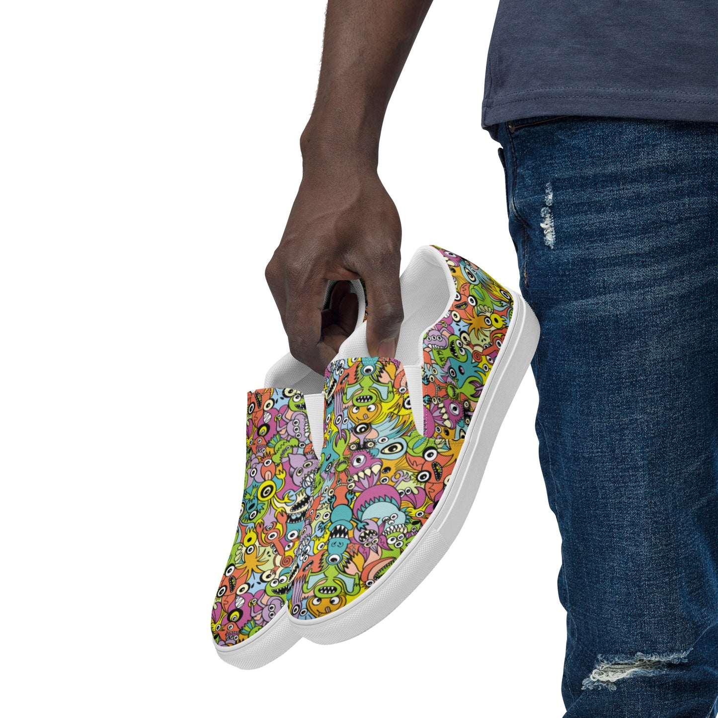Funny monsters fighting for the best spot for a pattern design Men’s slip-on canvas shoes. Lifestyle