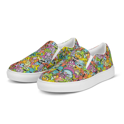 Funny monsters fighting for the best spot for a pattern design Men’s slip-on canvas shoes. Overview