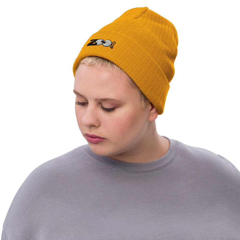 Woman wearing Zoo&co branded Recycled cuffed beanie. Mustard. Front view