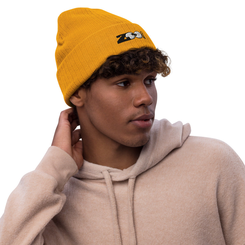 Man wearing Zoo&co branded Recycled cuffed beanie. Mustard. Side view
