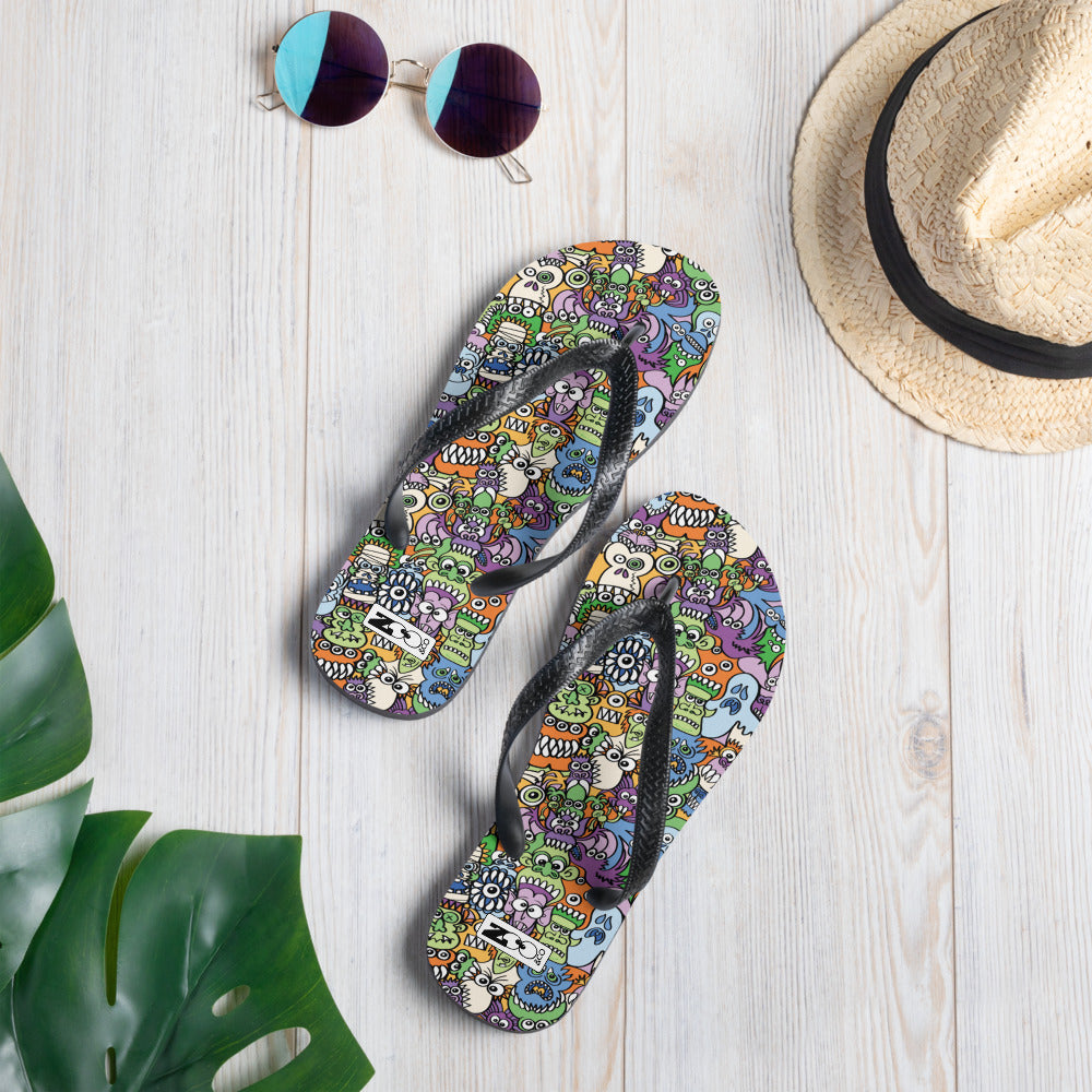 All the spooky Halloween monsters in a pattern design Flip-Flops. Lifestyle