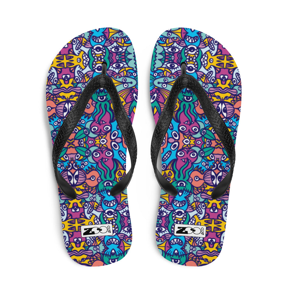 Whimsical design featuring multicolor critters from another world Flip-Flops. Top view