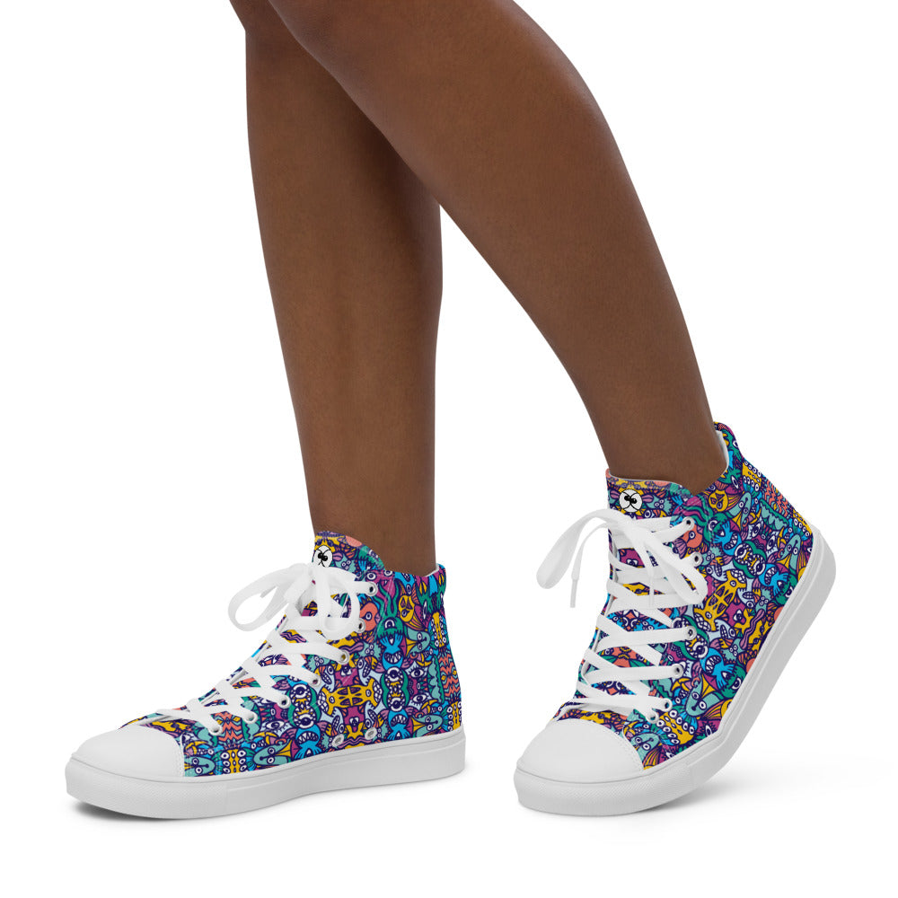Whimsical design featuring multicolor critters from another world Women’s high top canvas shoes. Lifestyle