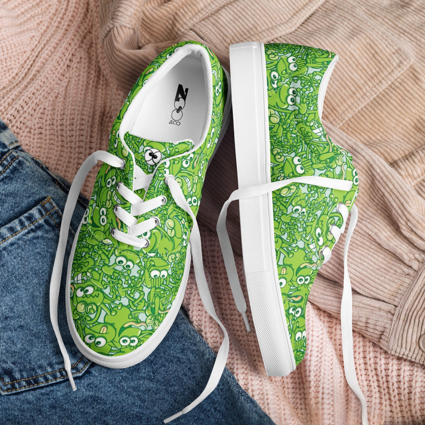 A tangled army of happy green frogs appears when the rain stops Women’s lace-up canvas shoes. Lifestyle