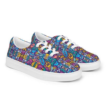 Whimsical design featuring multicolor critters from another world Women’s lace-up canvas shoes. Overview