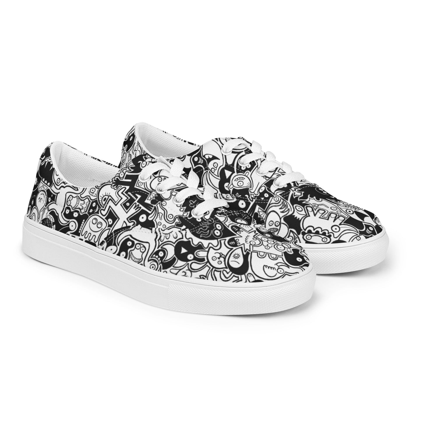 Joyful crowd of black and white doodle creatures Women’s lace-up canvas shoes. Overview