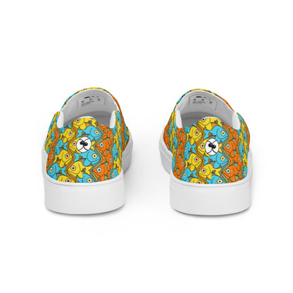 Smiling fishes colorful pattern Women’s slip-on canvas shoes. Back view