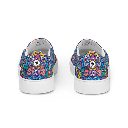Whimsical design featuring multicolor critters from another world Women’s slip-on canvas shoes. Back view