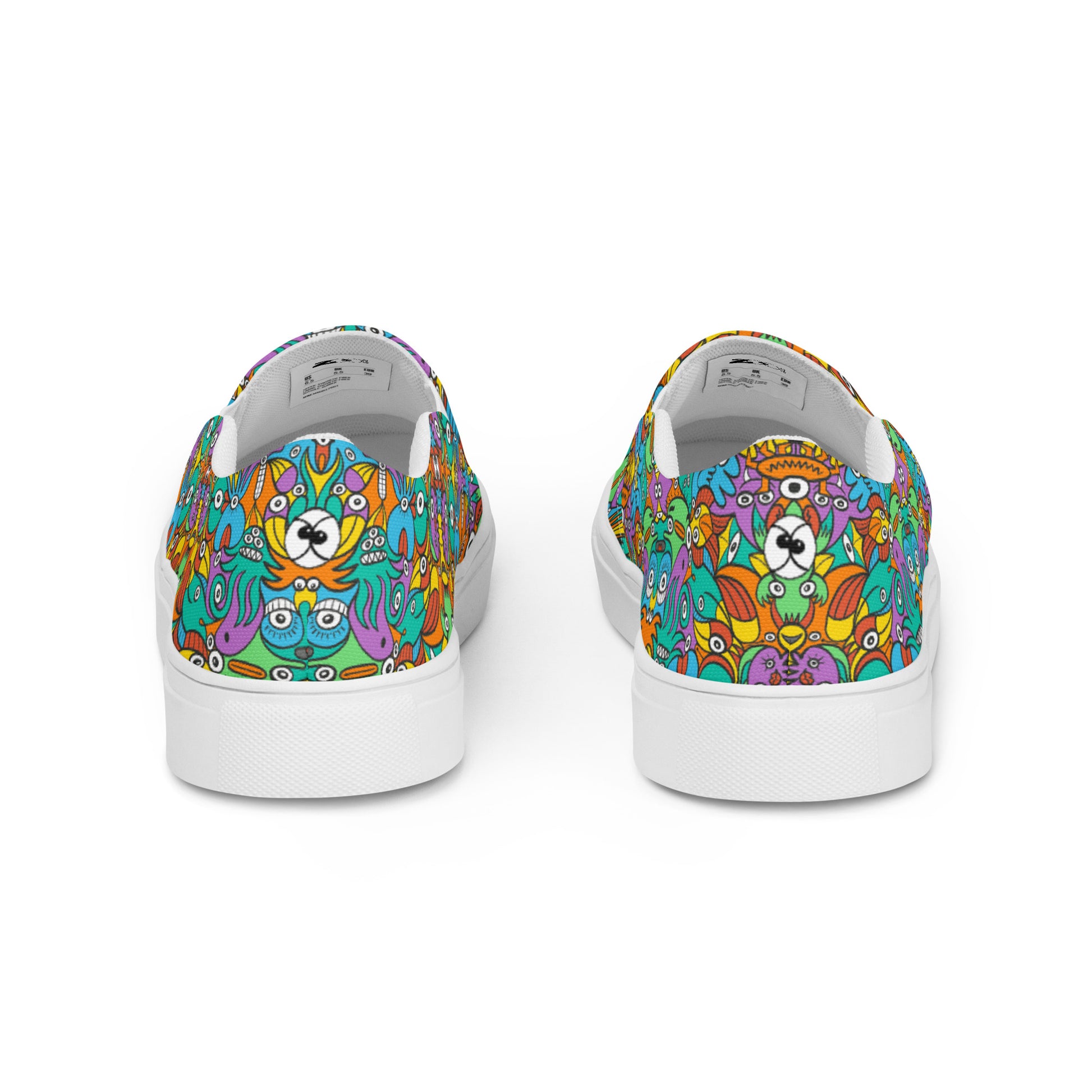 Fantastic doodle world full of weird creatures Women’s slip-on canvas shoes. Back view