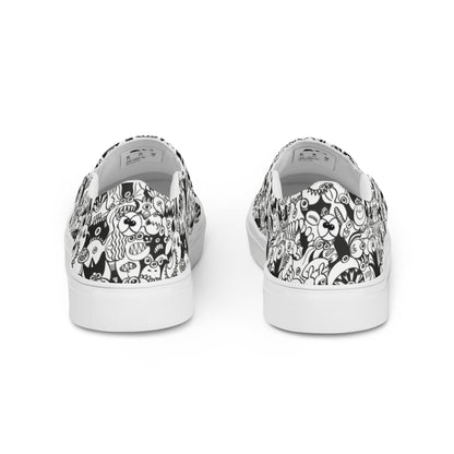 Black and white cool doodles art Women’s slip-on canvas shoes. Back view