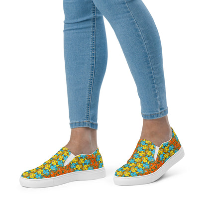 Smiling fishes colorful pattern Women’s slip-on canvas shoes. Lifestyle