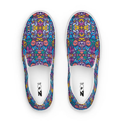 Whimsical design featuring multicolor critters from another world Women’s slip-on canvas shoes. Top view