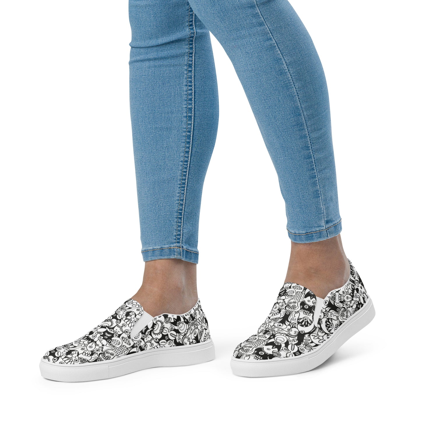 Black and white cool doodles art Women’s slip-on canvas shoes. Lifestyle