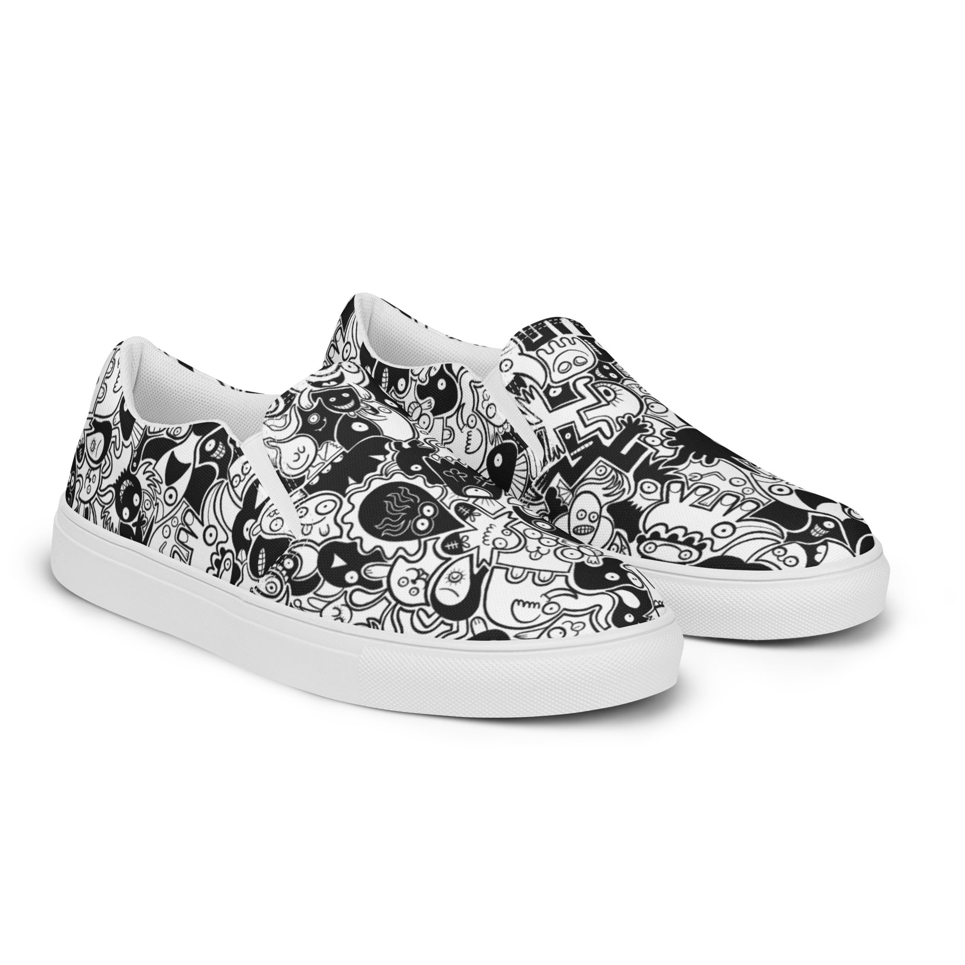 Joyful crowd of black and white doodle creatures Women’s slip-on canvas shoes. Overview
